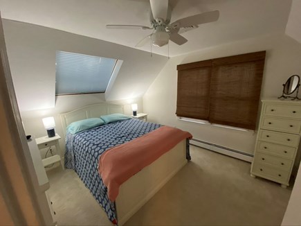 Eastham, Chloe's Classic Cape Cape Cod vacation rental - Queen bedroom has dressers, closet, and TV.