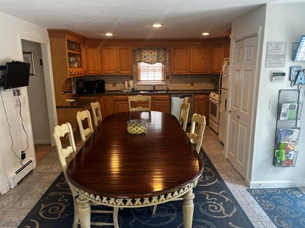 Eastham, Chloe's Classic Cape Cape Cod vacation rental - Spacious, well equipped kitchen with long dining table