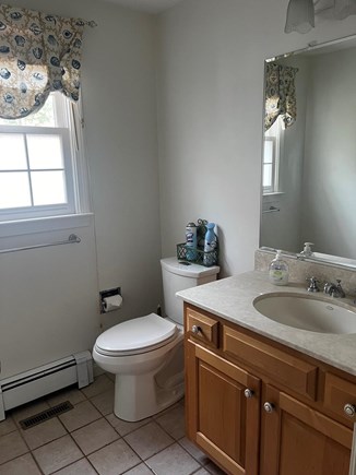 Eastham, Chloe's Classic Cape Cape Cod vacation rental - 1st floor half bath