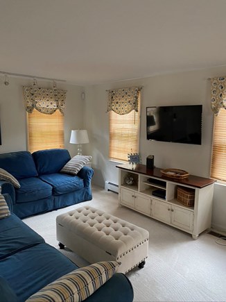 Eastham, Chloe's Classic Cape Cape Cod vacation rental - Comfy couch and love seat in living room.  Smart TV