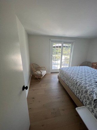 Massasoit Hills, Eastham, MA  Cape Cod vacation rental - Queen bedroom with slider to deck
