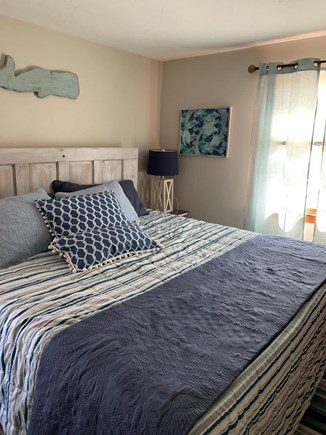 South Dennis Cape Cod vacation rental - Master bedroom with king bed, large closet, bureau, and Roku TV