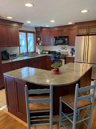 Dennis Cape Cod vacation rental - Well equipped kitchen has granite and stainless steel appliances