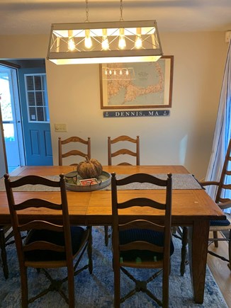 Dennis Cape Cod vacation rental - Dining table expands to seat 8. Sliders open to the deck!
