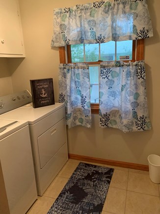 Dennis Cape Cod vacation rental - Separate laundry/mud room with full size washer & dryer and bench