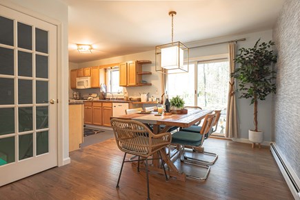 Eastham Cape Cod vacation rental - Dining room and kitchen opens onto patio