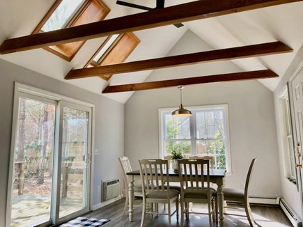 Brewster Cape Cod vacation rental - Dining area with cathedral ceiling, skylights & exterior access