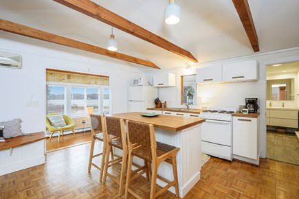 South Dennis Cape Cod vacation rental - Kitchen with island and 3 chairs