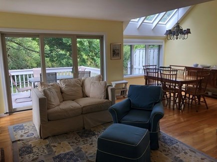 Brewster, Ocean Edge Bayside Cape Cod vacation rental - Living room, deck and dining room
