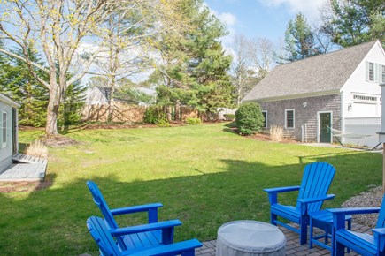 Dennis Cape Cod vacation rental - A huge, fully fenced rear yard for your 4 legged family to romp!