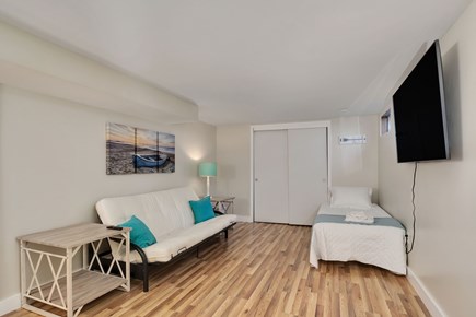 East Falmouth Cape Cod vacation rental - Basement bedroom/bonus living area with large Samsung 4k smart tv