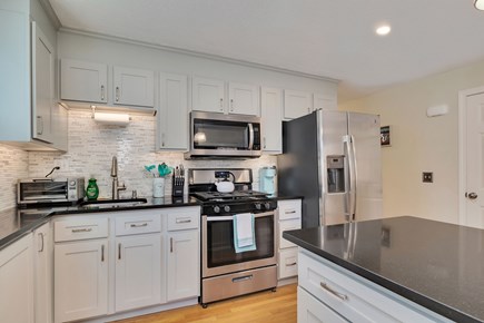 East Falmouth Cape Cod vacation rental - Updated kitchen with seating for 4 at island