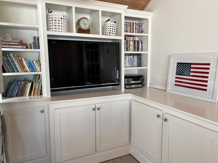 South Yarmouth Cape Cod vacation rental - Porch has all the books, DVD’s, board games, and toys