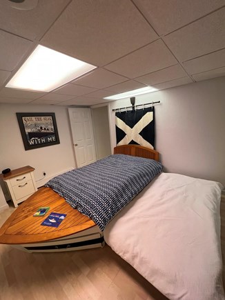 Barnstable Village, MA Cape Cod vacation rental - Bunk room with bathroom in basement. Boat bed w/ full trundle