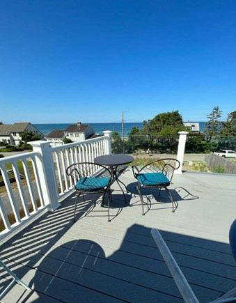 Plymouth, Priscilla Beach MA vacation rental - Deck with seating and dining overlooking the sea.