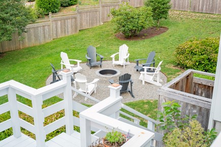 Chatham Cape Cod vacation rental - Outdoor fenced-in yard with firepit.