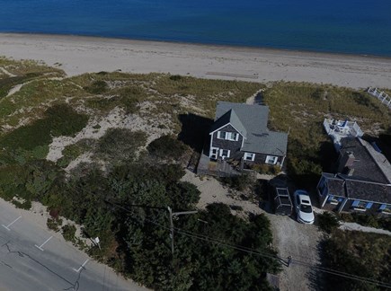Sandwich, 55NSB Cape Cod vacation rental - House is on the left. It abuts town owned land