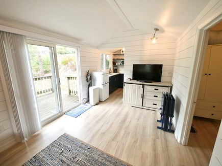 Wellfleet Village Cape Cod vacation rental - Cottage living room looking toward kitchenette