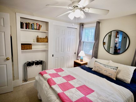 Wellfleet Village Cape Cod vacation rental - Bedroom 2, showing closet and bookshelves