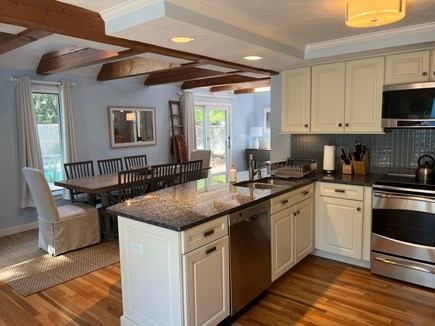 Mashpee, New Seabury Cape Cod vacation rental - With an open kitchen and dining area, the flow is great.