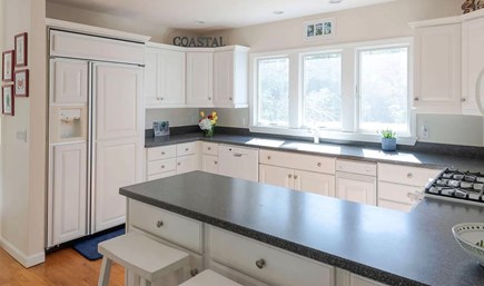 New Seabury, Mashpee Cape Cod vacation rental - Open kitchen, stocked with pots, pans, plates and silverware.