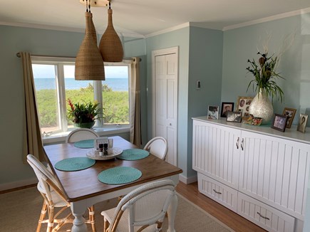 Dennisport Cape Cod vacation rental - Dining room with queen size cabinet bed if needed.