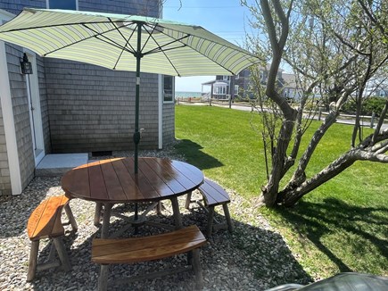 Yarmouth on Lewis Bay Cape Cod vacation rental - Private grill & dining area w/ water view & huge play yard!