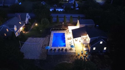 East Orleans Cape Cod vacation rental - Night shot showing the new pool in between the two houses