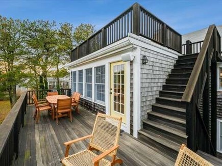 Chatham Cape Cod vacation rental - Main level deck with dining table and chairs for relaxing