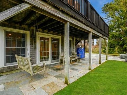 Chatham Cape Cod vacation rental - Lower level patio with grill, swing and shade over head