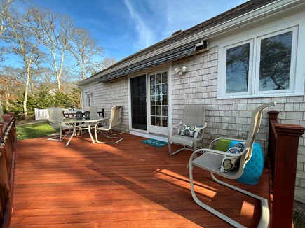 Harwich Cape Cod vacation rental - Comfortable back deck with seating for six.