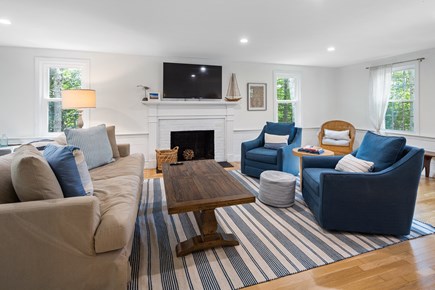 Brewster, At Greenland Pond Cape Cod vacation rental - Large living room with multiple seating areas and smart TV.