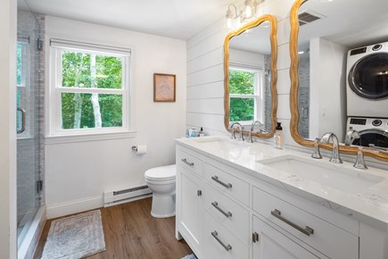 Brewster, At Greenland Pond Cape Cod vacation rental - Upstairs bath with shower and laundry.