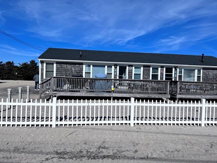 West Dennis Cape Cod vacation rental - Front View of the house. Deck with grill and pi picnicTable.
