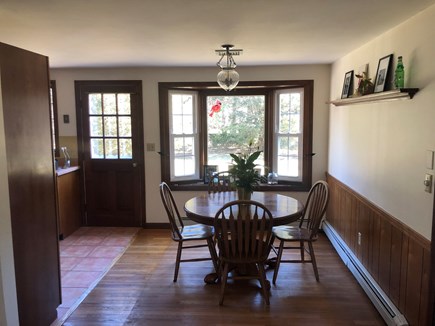 Eastham Cape Cod vacation rental - Dining room with beautiful view of backyard and deck access