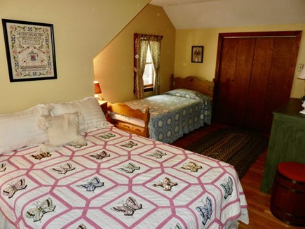 Wellfleet Cape Cod vacation rental - 2nd floor bedroom with double and twin  beds.
