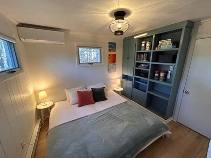 Wellfleet Cape Cod vacation rental - Queen bedroom with built-in bookcase for all your storage needs.