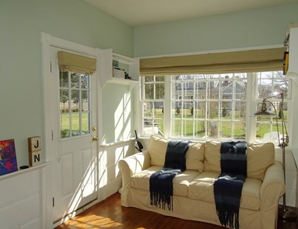 Falmouth Cape Cod vacation rental - Sun room with large flat screen TV, opens to back deck