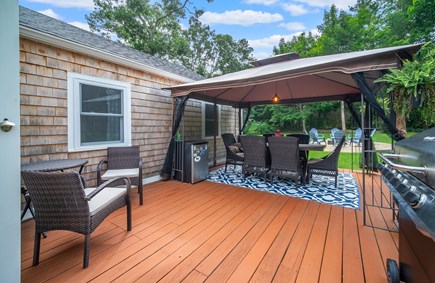 Marstons Mills Cape Cod vacation rental - Outdoor living area with grill and mini fridge