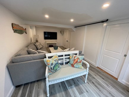 Chatham Bookends Cape Cod vacation rental - Walkout family room with 70 inch full cable package and PS5