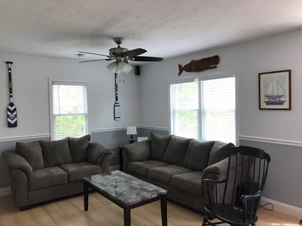 Dennisport Cape Cod vacation rental - Living room with love seat and queen size sleep sofa.
