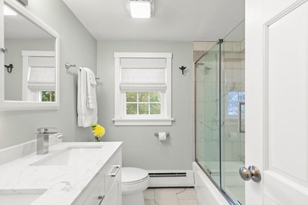 South Yarmouth Cape Cod vacation rental - Dual sink vanity, medicine cabinets, shower/tub on second floor