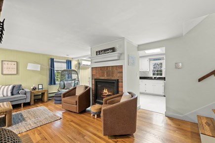 South Yarmouth Cape Cod vacation rental - Gas fireplace in living room across 4 stairs leading to bedrooms