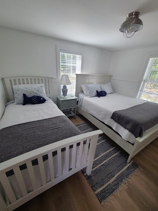 South Dennis Cape Cod vacation rental - 2nd bedroom with a queen bed and a twin bed and smart tv.