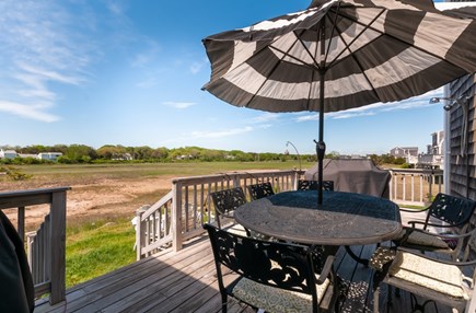 East Sandwich Cape Cod vacation rental - Deck with outdoor seating overlooks tidal marsh