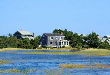 East Sandwich Cape Cod vacation rental - Back view of house and marsh at high tide