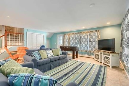 Dennis Cape Cod vacation rental - Lower level with TV, foosball and access to main pool area