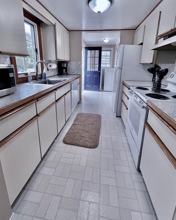 East Orleans Cape Cod vacation rental - Kitchen - Shares mini split dining room - washer & dryer