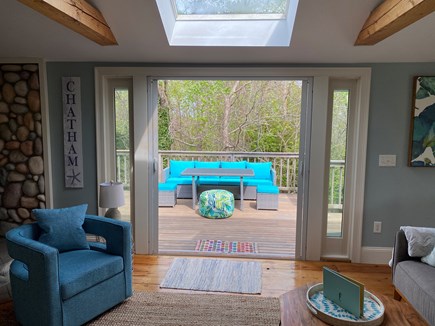 Chatham, Summer Catch Cape Cod vacation rental - French doors leading to expansive deck with more seating