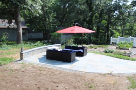 Eastham Cape Cod vacation rental - Patio w/gas fire pit, retractable led umbrella